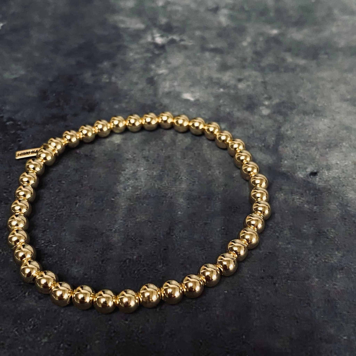 14 karat Guldbelagt armbånd sammensat af sirlige perler - VIAMAJA.DK