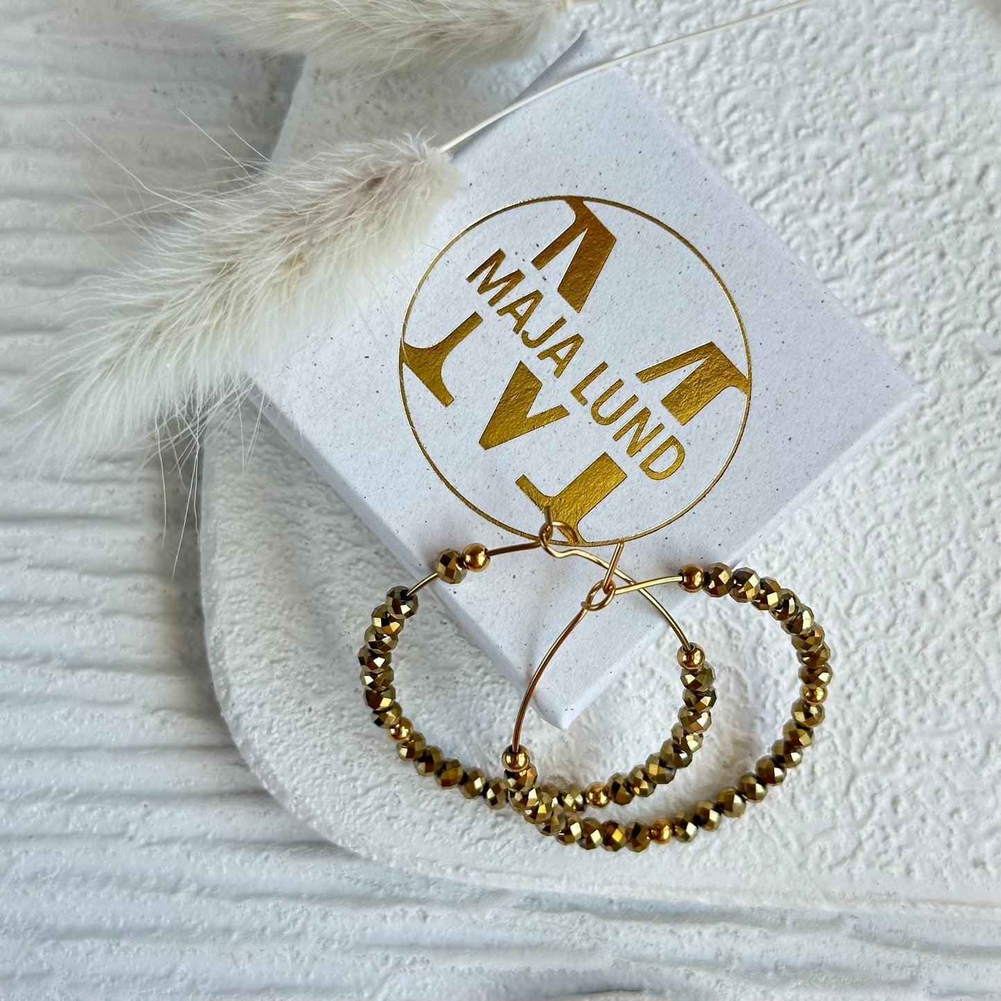 Örhängen Merle – Gyllene