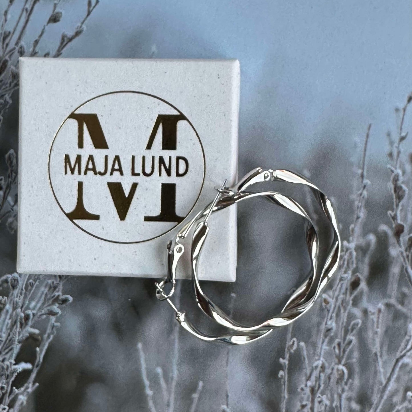 Hopp Twisted Silverbelagda Örhängen