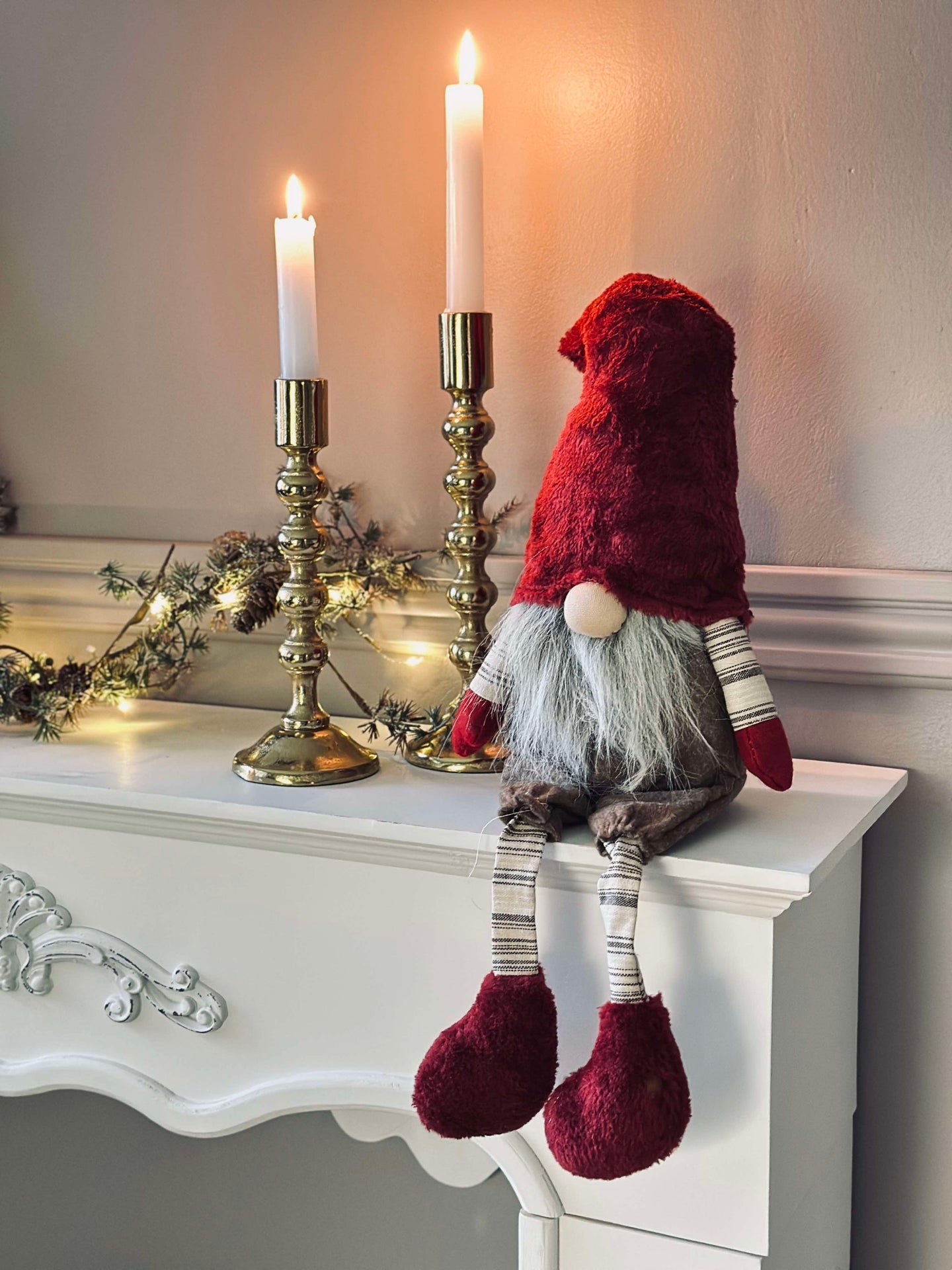 Tomte med dinglande ben