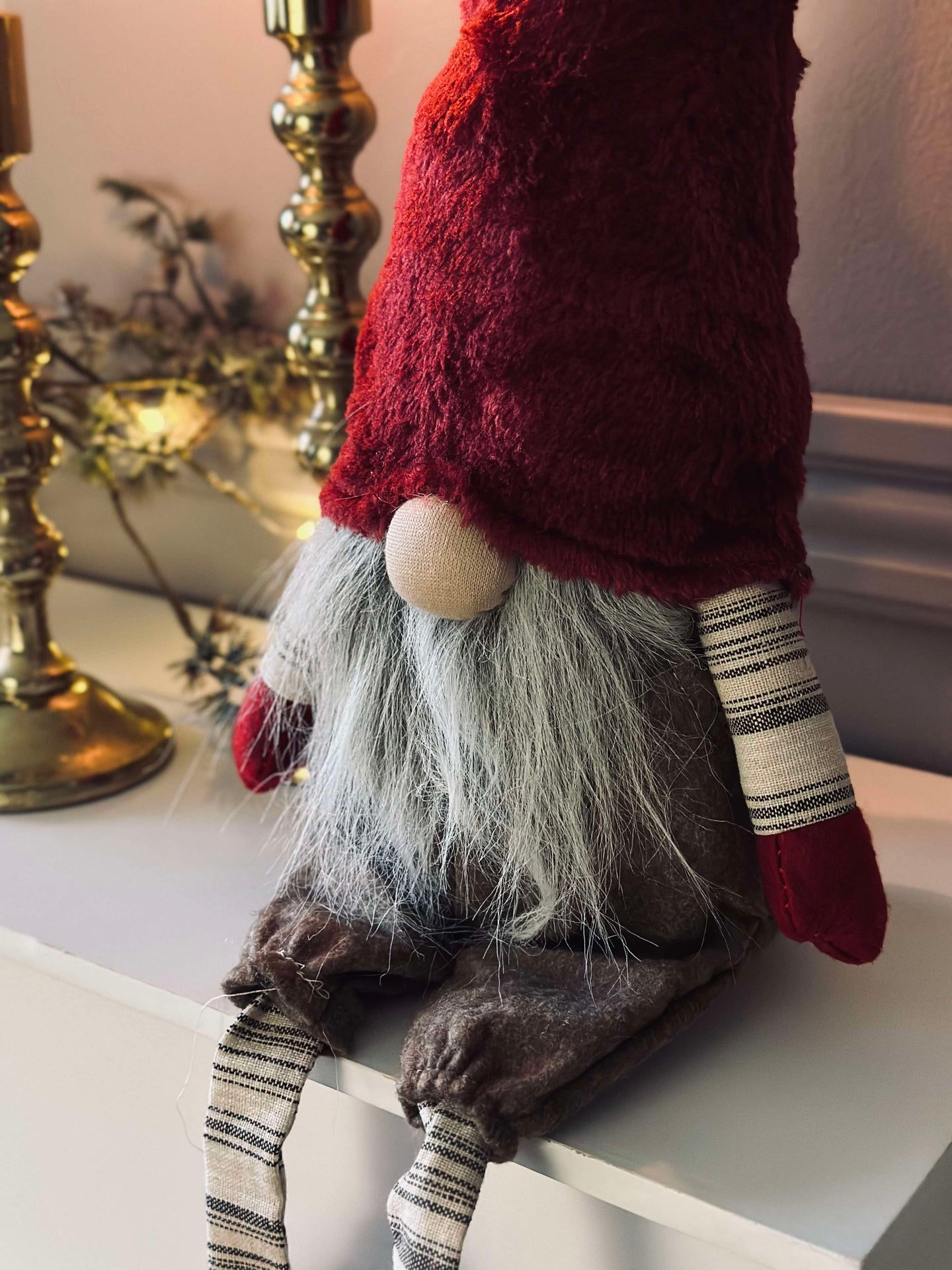 Tomte med dinglande ben