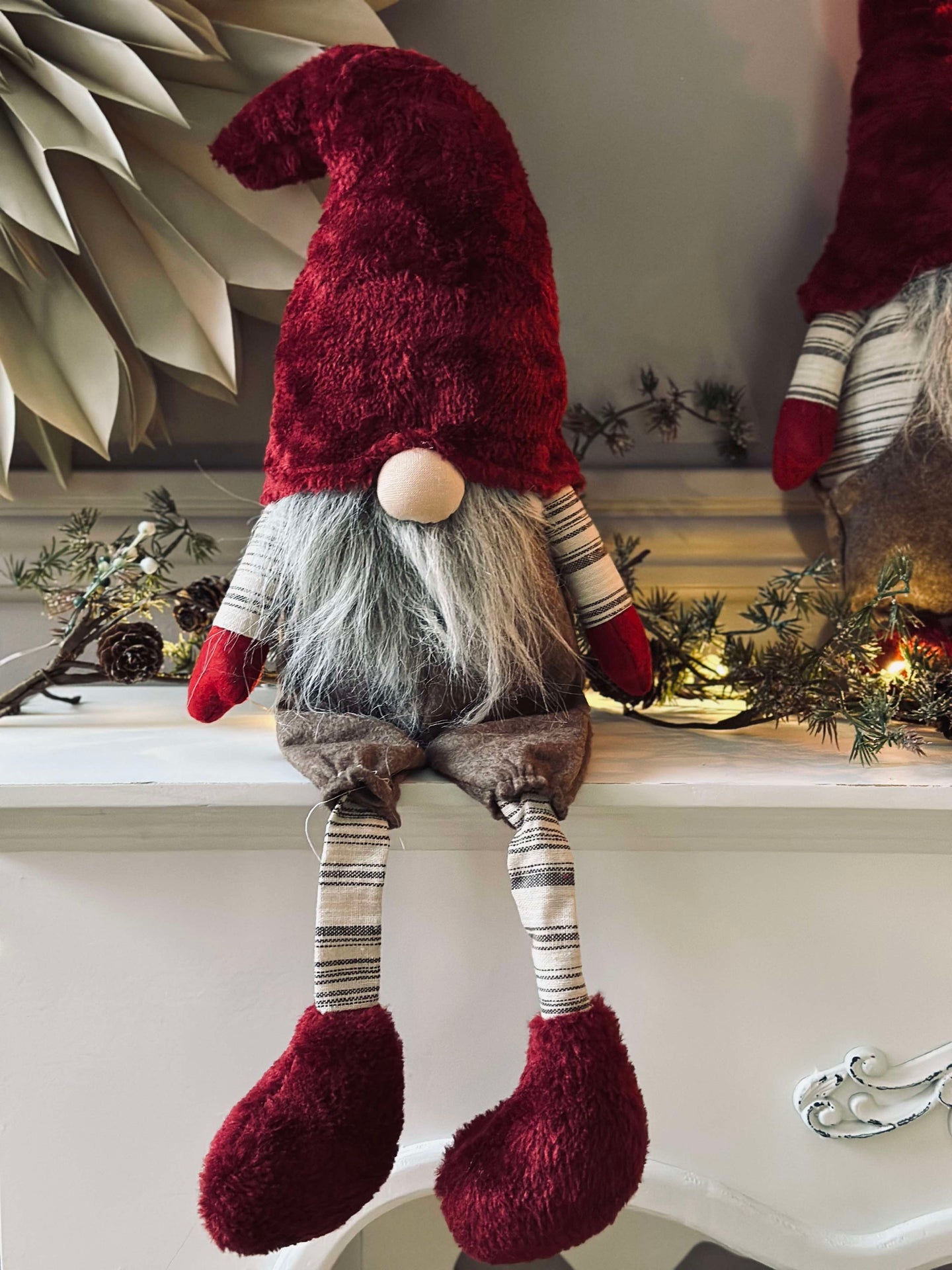 Tomte med dinglande ben