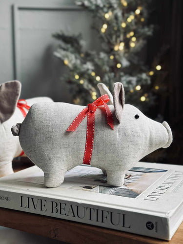 Julgris med rosett - Sand