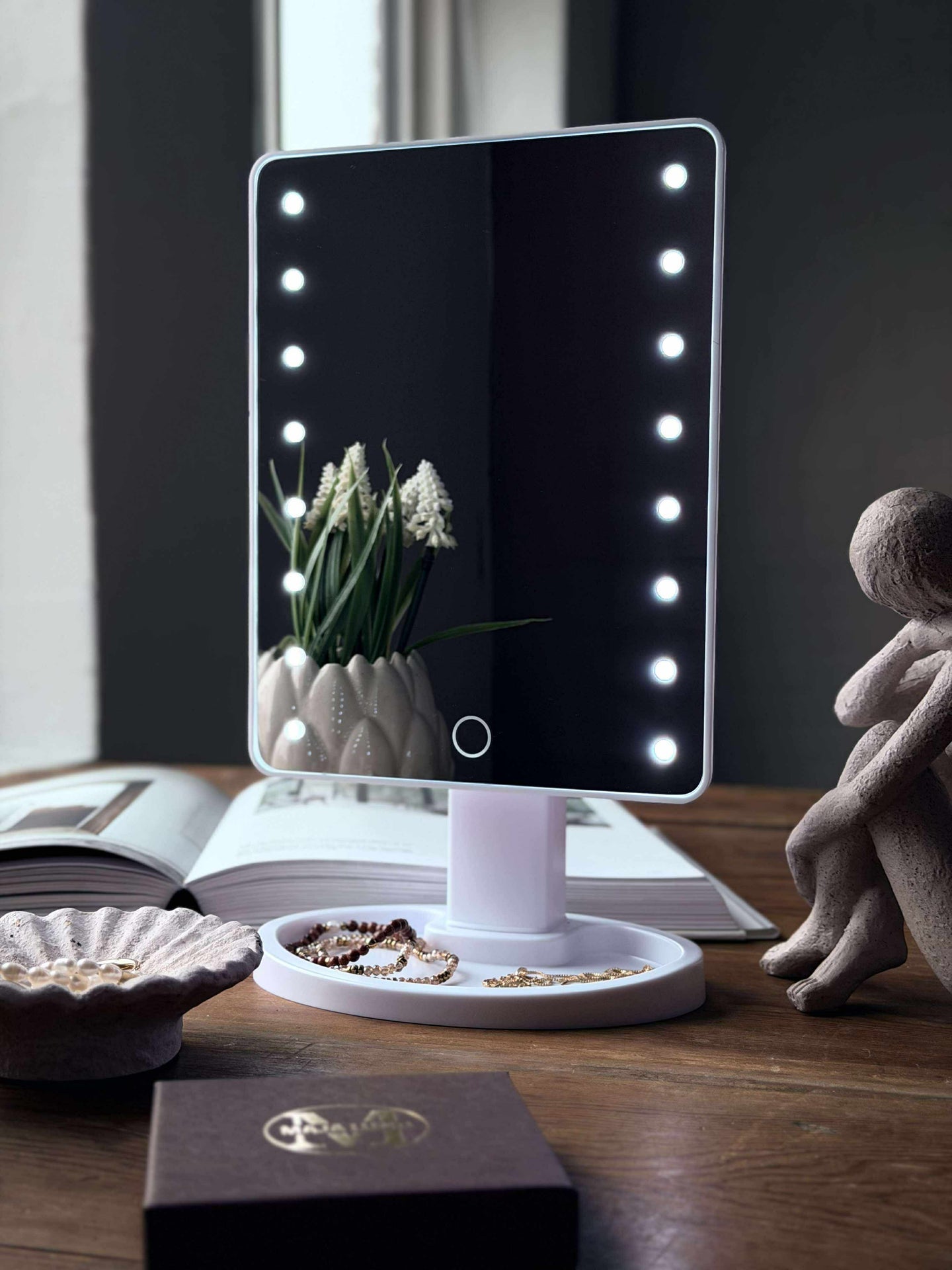 Sminkspegel med belysning