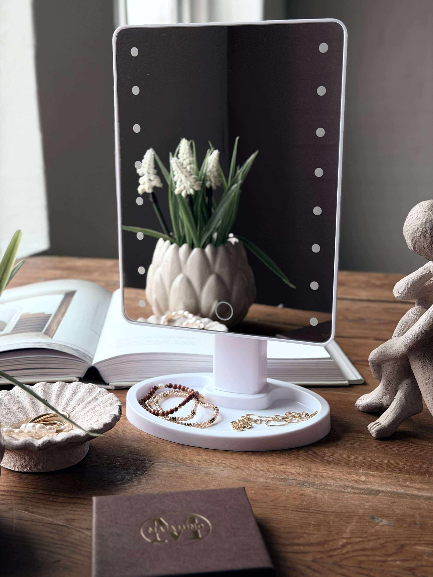 Sminkspegel med belysning