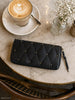 Clutch med nitar - LIMA Small svart
