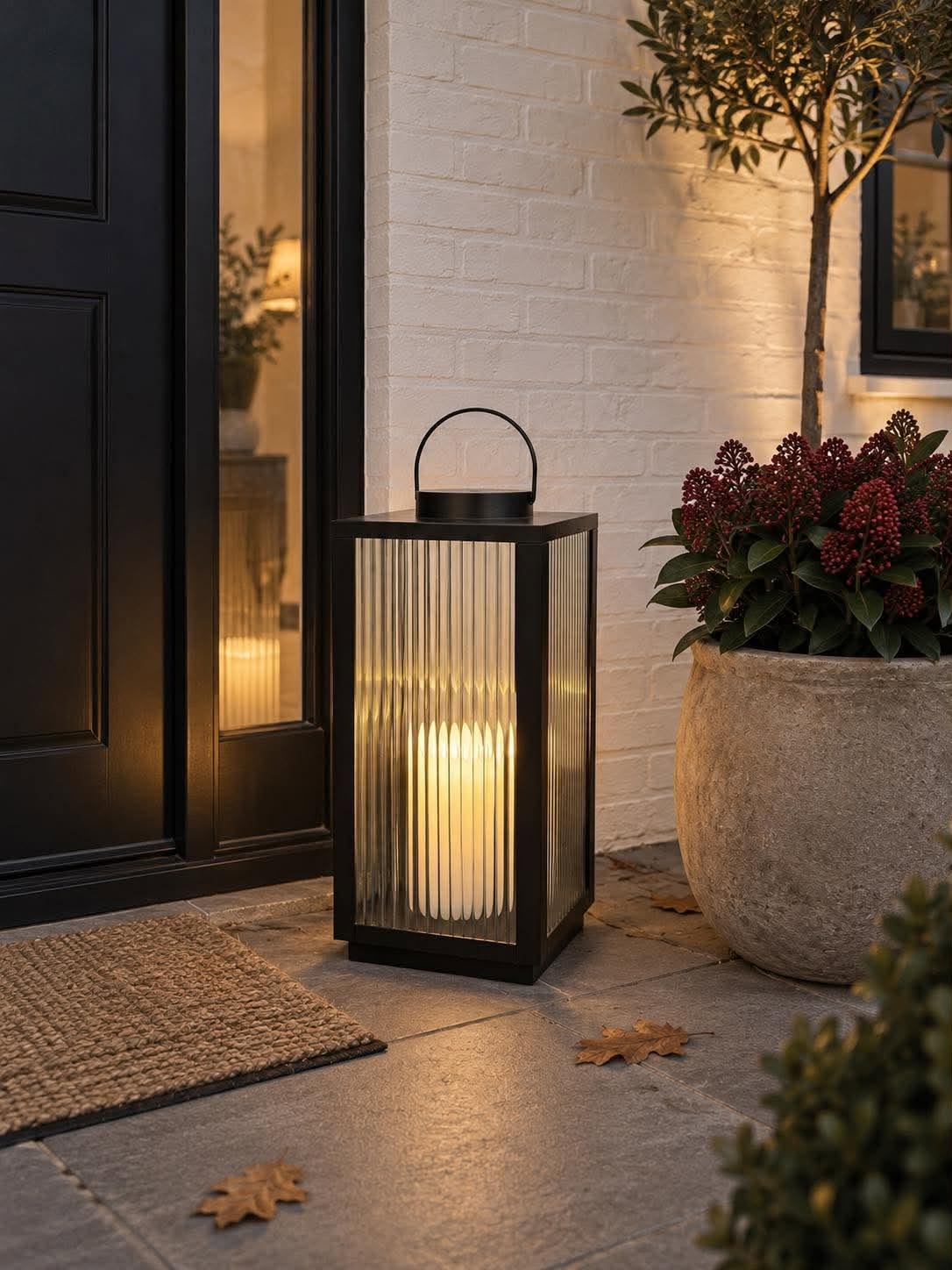 Lykta Nordic med blockljus och timer