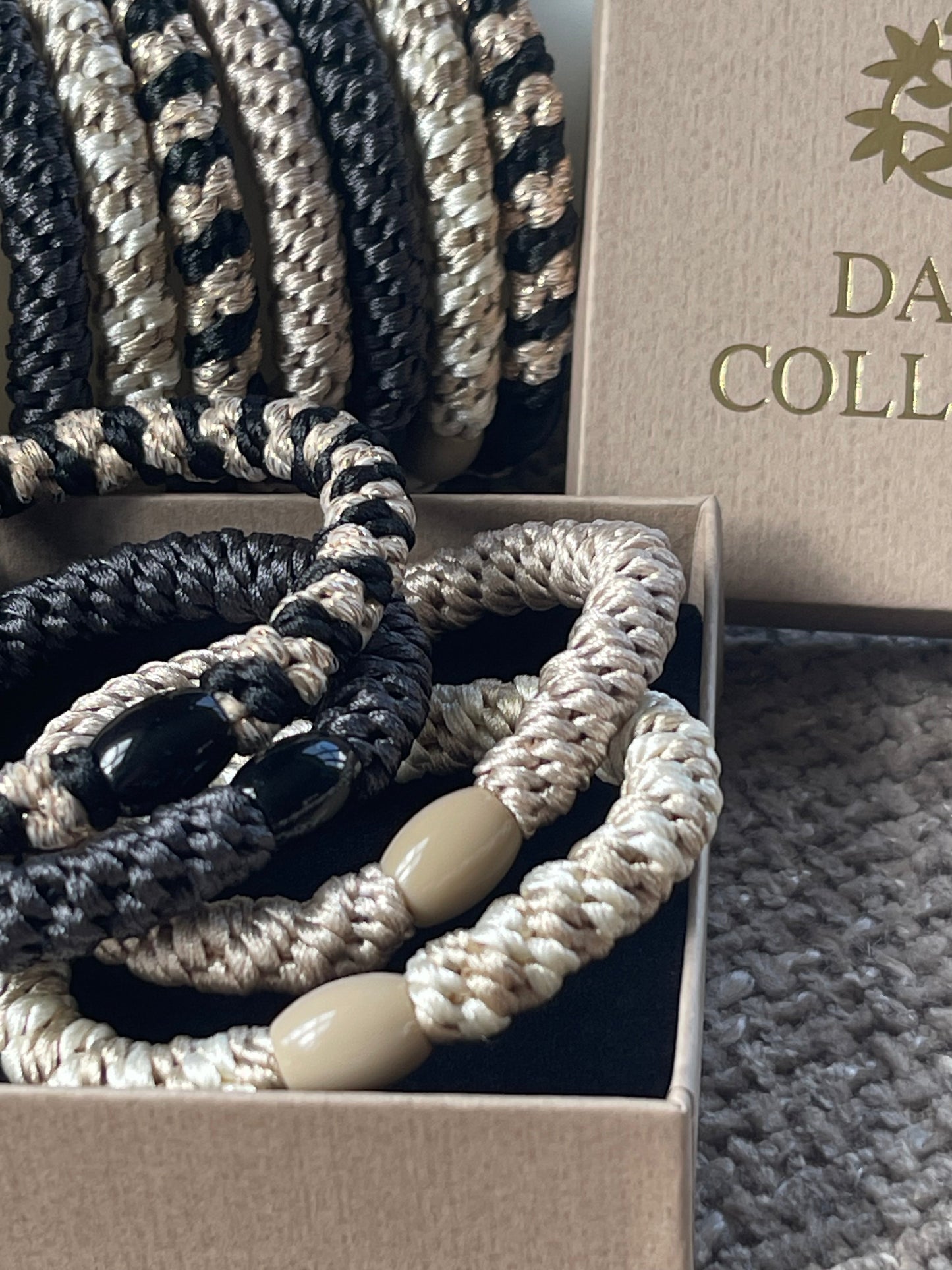 Hårsnoddar Supreme Black / Nature - 4 st.