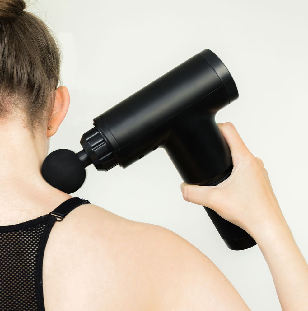 Massagepistol med 4 huvuden