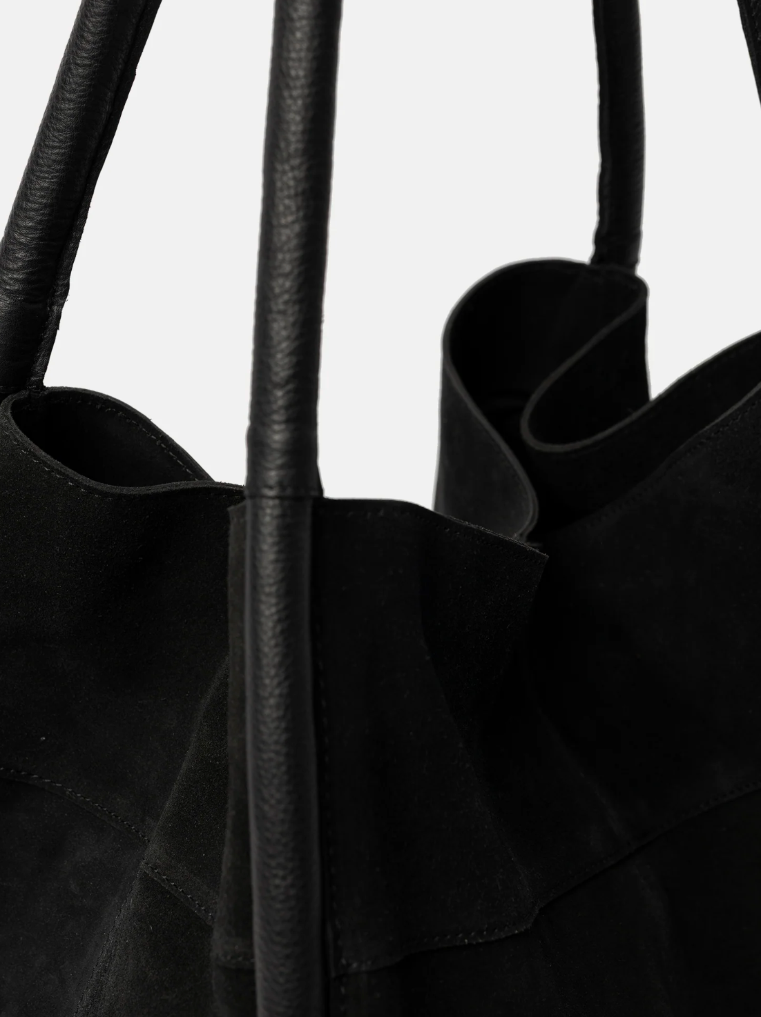 Shopper i svart mocka