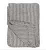 Quilt vita och svarta ränder